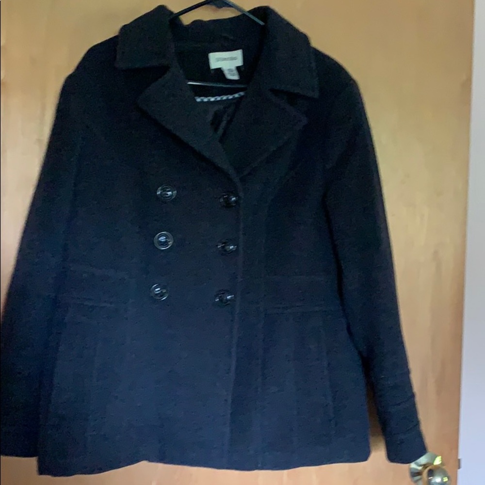 Very clean winter coat. Dark black gray.